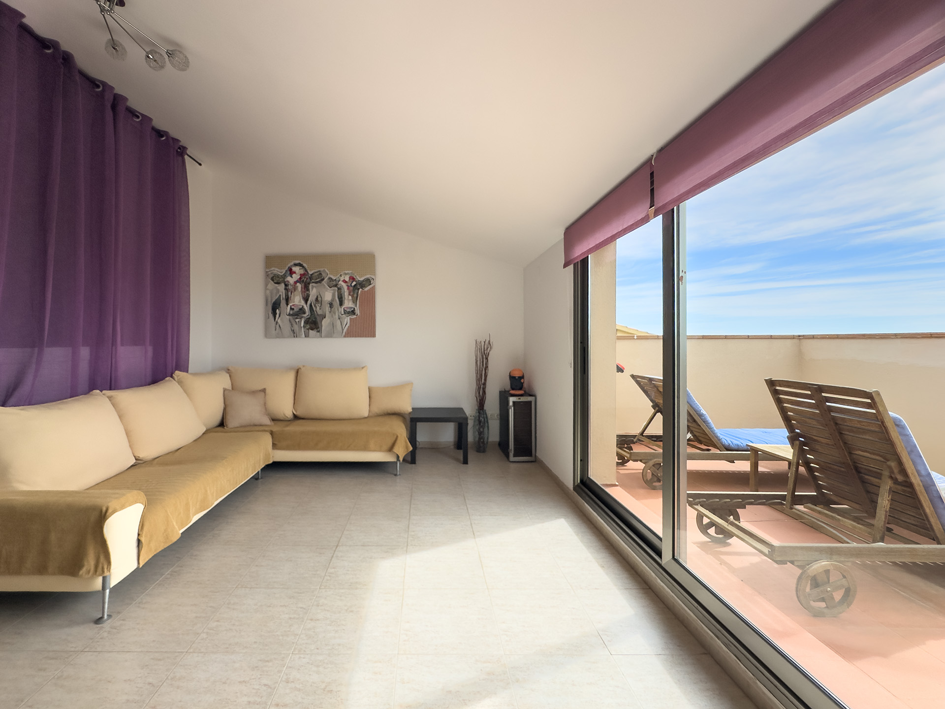 Attic lounge area with workspace and terrace access — Villa MiraMar Mediterranian