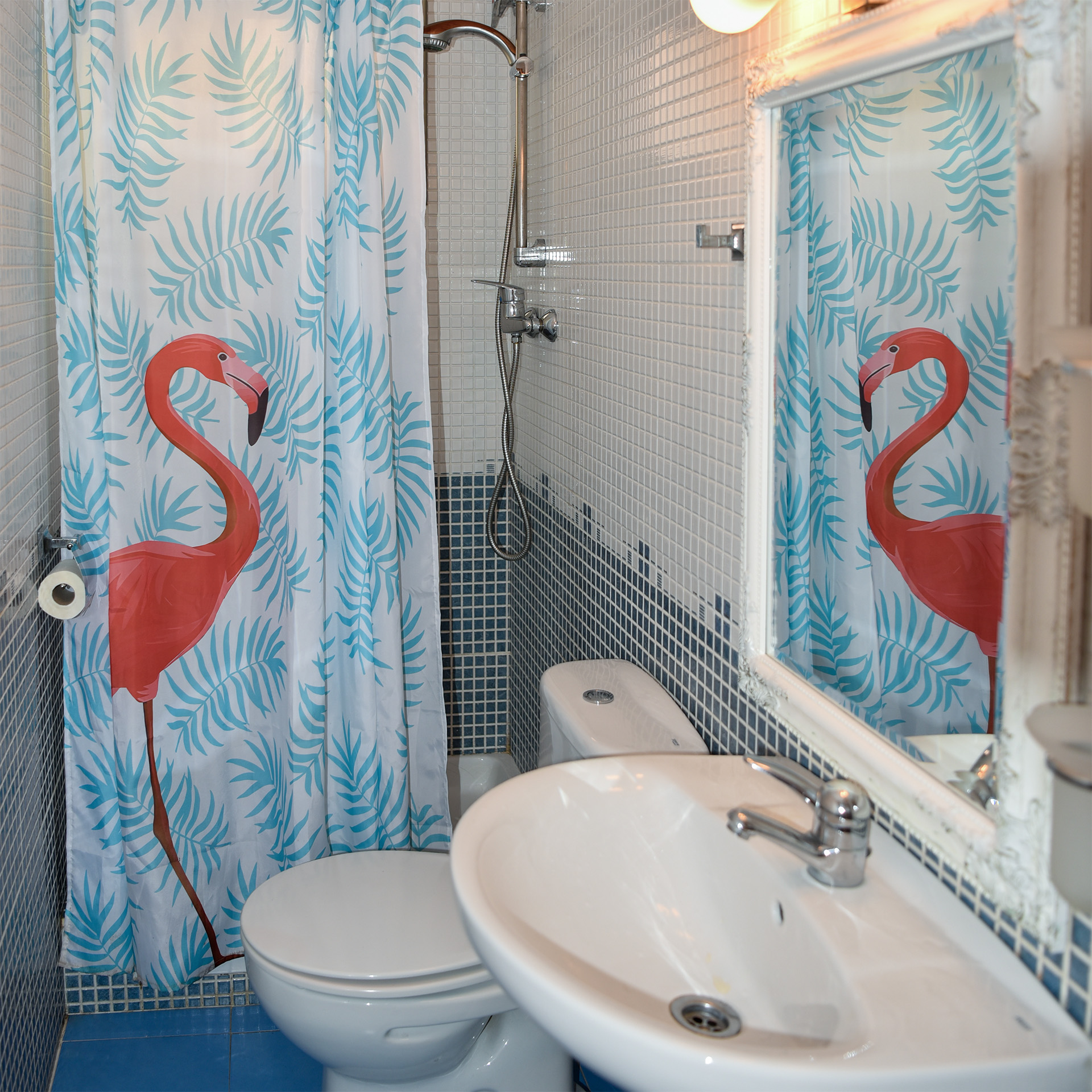Bathroom with shower near kitchen on main living level — Villa MiraMar in coastal