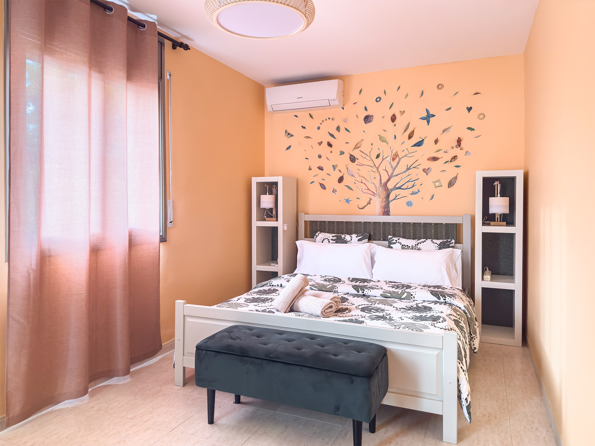 Second double bedroom with garden-facing windows — Villa MiraMar near Girona