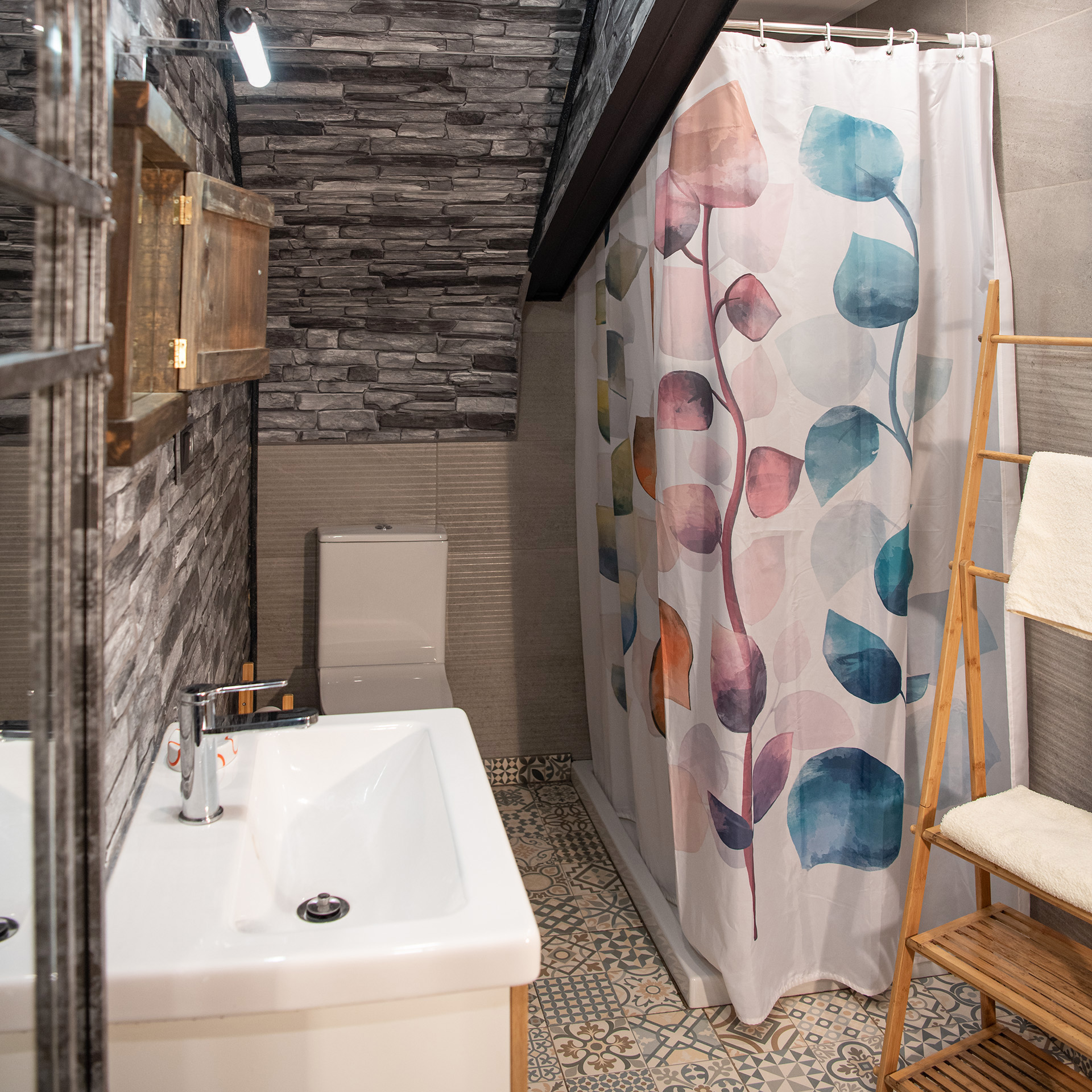 Ground-floor shower room near pool area — Villa MiraMar on the Barcelona coast